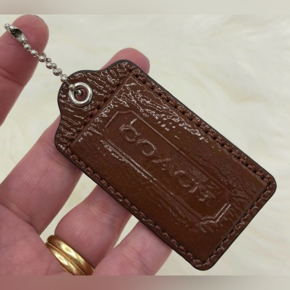 Coach Charm